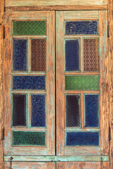 Wooden framed windows and stained glass decorated in retro style.