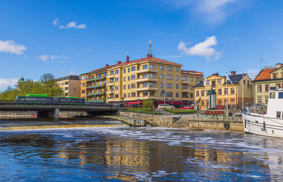 Beautiful view of central part of city of Uppsala with river and bridge on sunny summer day. Sweden.