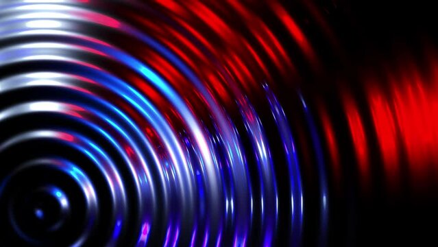 Futuristic abstract bokeh light motion background, shining colorful sparkles particles with bokeh light effect drop falls into water and diverging circles of water on the dark background concept.