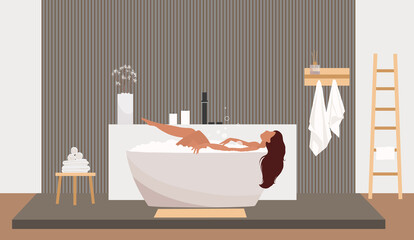 Naklejka na ściany i meble Pretty woman relaxing at bathtub in modern luxurious bathroom. Minimalist decor and towels