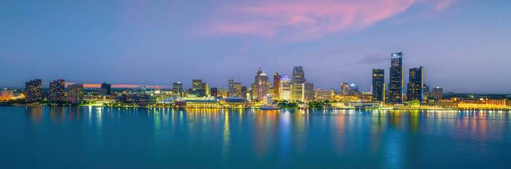 Obraz na płótnie Canvas Detroit skyline in Michigan, cityscape of USA at sunset shot from Windsor, Ontario