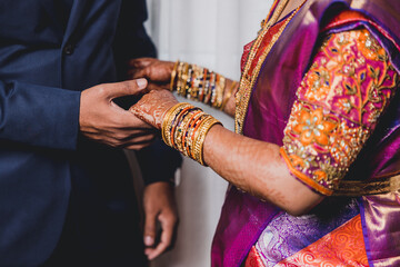 couple holding hands
