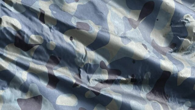 Blue army camouflage textile fabric slow waving on the wind background. Navy military camo clothing texture. Full filling slow motion seamless loop.