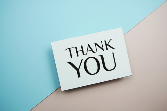Thank You text message on blue and pink background
