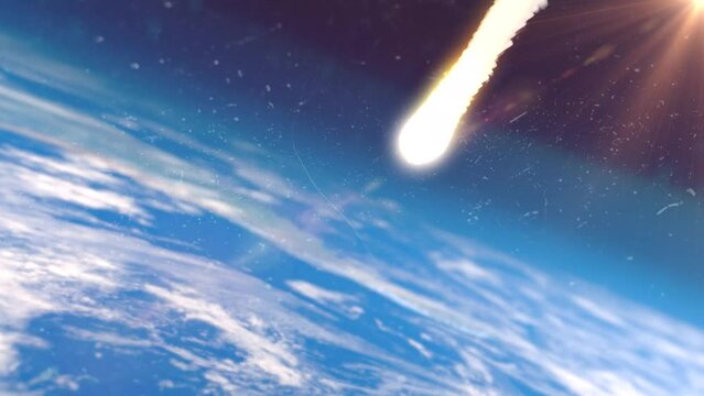 Meteorite flies to earth. Apocalypse concept. Satellite image of a meteor. Atmosphere and sun glare. End of the world.