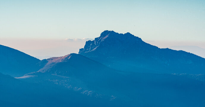 Velky Rozsutec and Osnica hills in Mala Fatra mountains from Velky Choc hill in Chocske vrchy mountains in Slovakia