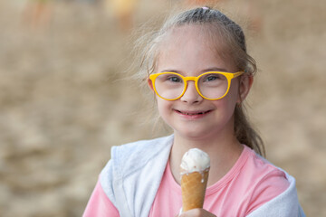 Girl with Down Syndrome eating ice cream