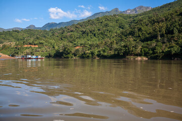 Fototapeta na wymiar Riverside landscape of Nam Ou River in Laos