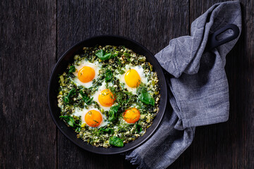green shakshuka in frying pan, top view