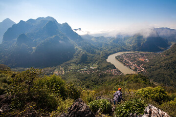 Fototapeta na wymiar Landscape of Nong Khiaw city from Pha Daeng Peak Viewpoint, Laos