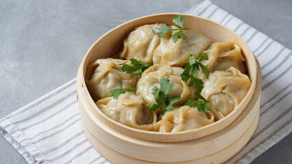 Manti, dumplings with minced meat wrapped in unleavened dough and cooked by steaming