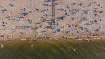 A view of the beach in Stogi on a beautiful sunny day. Gdansk, Poland. - obrazy, fototapety, plakaty