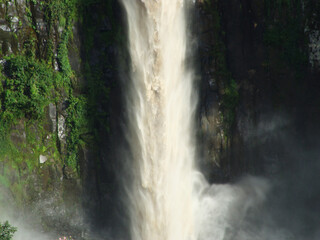 Fototapeta na wymiar Waterfall in the forest (with zoom) – Cachoeira do Itambé, Cássia dos Coqueiros-SP