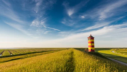 Tuinposter Der Pilsumer Leuchtturm in Ostfriesland  Deutschland © majonit
