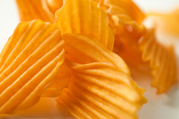 close-up, golden yellow, sweet potato chips, white background