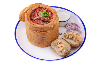 Borscht inside bread with meat,