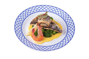 Fried fish fillet with lemons, shrimp, broccoli