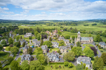 Luxury countryside rural village aerial view from above in Quarriers Village in Scotland