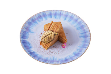Dessert napoleon with chocolate leaf