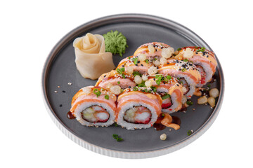 Rolls with salmon, onions, shrimps, sesame seeds, flying fish caviar