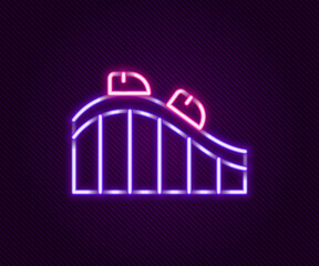 Glowing neon line Roller coaster icon isolated on black background. Amusement park. Childrens entertainment playground, recreation park. Colorful outline concept. Vector