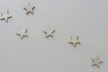 wooden stars on blank paper