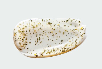 Drop of cleansing or toning face gel with gold particles