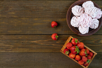 strawberry zephyr top view wooden background, copy space