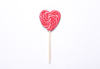 Heart shaped lollipop isolated on white background