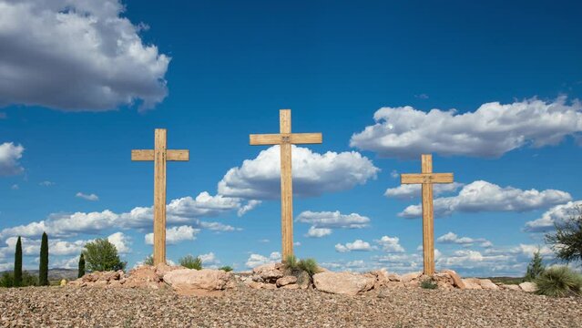 Three Christian Crosses with Cumulus Clouds Timelapse Zoom Out - Powered by Adobe