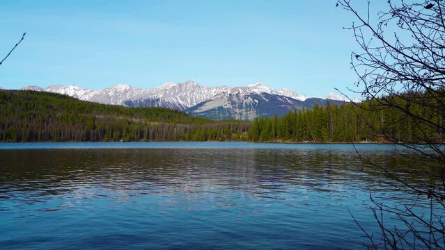 Pyramid Lake. Jasper National Park mountain range landscape, panoramic view. Canadian Rockies nature scenery background. Alberta, Canada. Mount Colin, Hawk Mountain.