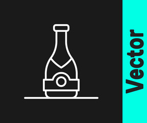 White line Champagne bottle icon isolated on black background. Vector