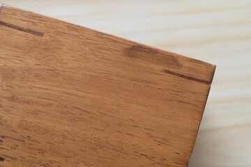 wooden object on wooden plank