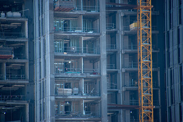 Construction in Kuwait City with the side of a skyscraper exposed