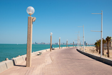 Naklejka premium A walkway following the Persian Gulf on the Green Island of Kuwait City, Kuwait