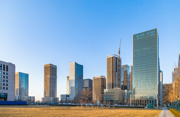 Fototapeta na wymiar Urban skyscrapers under blue skies
