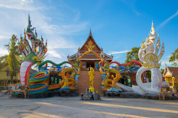 Lopburi, Thailand - December 30, 2021: Blue Serpent or Naga on Blue Sky Background with Natural...