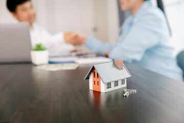 Real estate brokers or real estate agent with client or architect team Discussions about contracts , Saving money to invest in house or property in the future. Business property Concept.