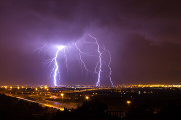 Thunder storm and massive lightning on a winter night