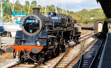 Black and red steam locomotive on Dartmouth Railway