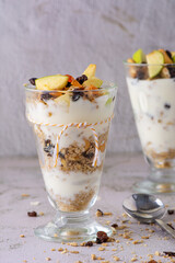Cups of Parfait made of granola and fruits