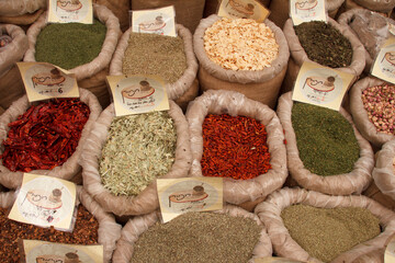 Spices in a vendor's stall in the Shook open air market in Jerusalem, Israel