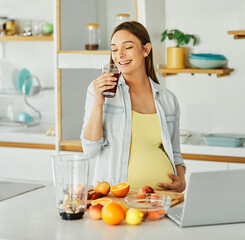 woman pregnant food healthy juice fruit kitchen pregnancy laptop diet recipe fresh mother preparing drink home computer