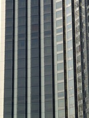 a close up photo on the windows and exterior of a luxury hotel in shenzhen, china