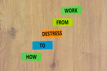 Destress from work symbol. Concept words How to destress from work on colored paper on a beautiful wooden background. Copy space. Psychological business destress from work concept. Copy space.