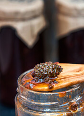 Jam from young pine cones collected in the Carpathian Mountains. Natural cough syrup
