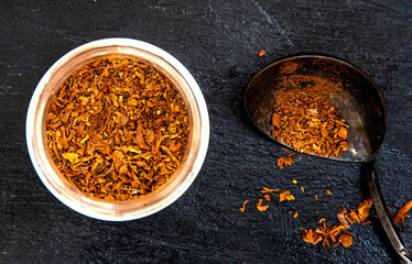 Dried white forest mushrooms seasoning in a jar. Mushroom seasoning