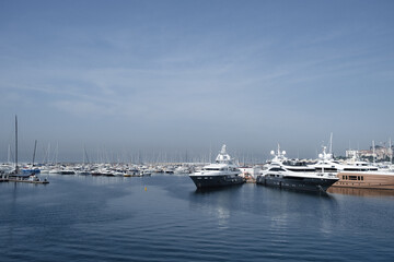 Istanbul, Turkey - June 2022: Yachts and boats waiting at the pier at sea.