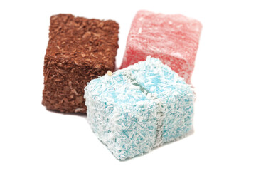 Cubes of traditional oriental sweets isolated on white background