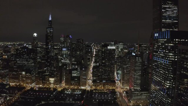 amazing drone footage of downtown chicago skyline at night